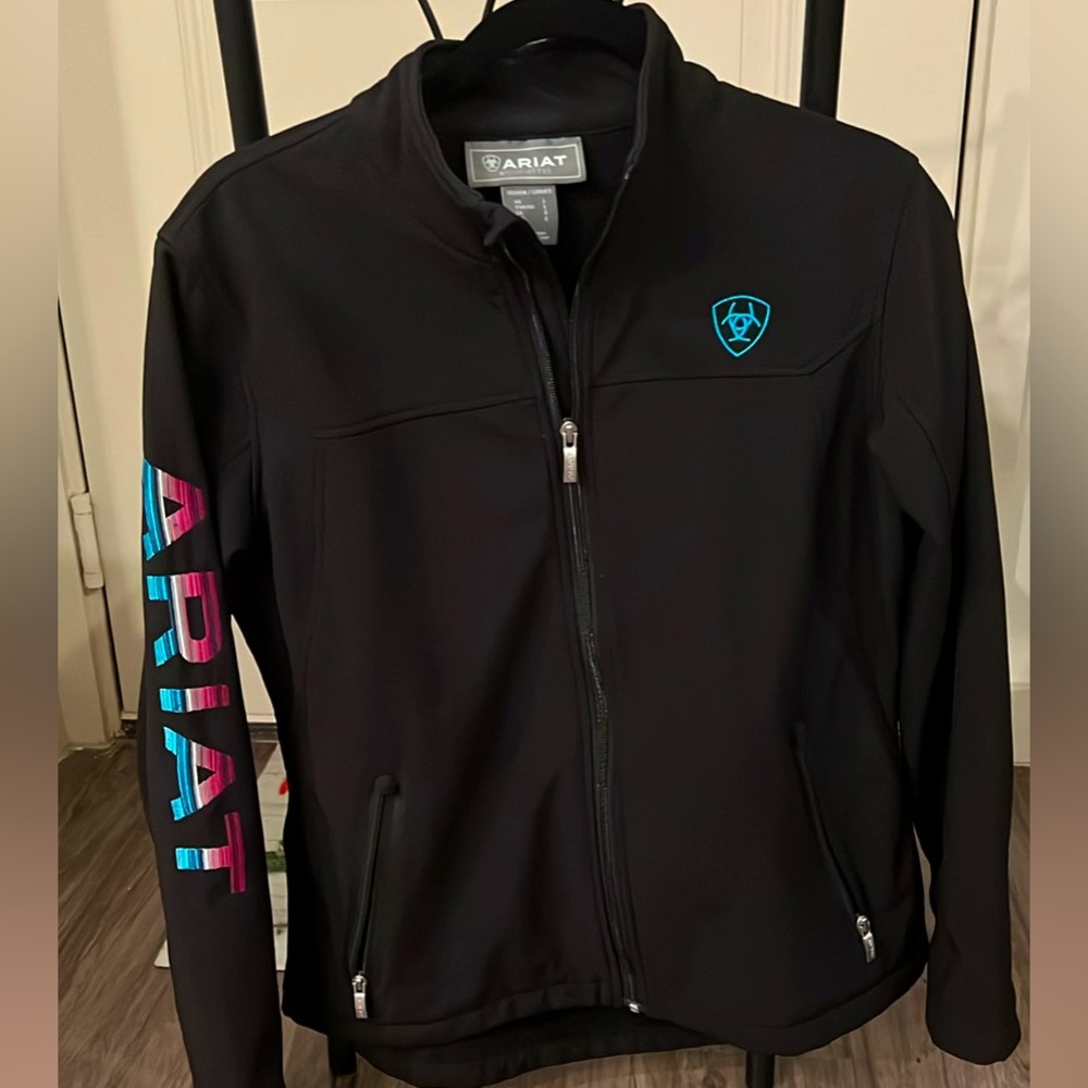Women’s Ariat Jacket
Colors: Turquoise with Pink and White Lettering